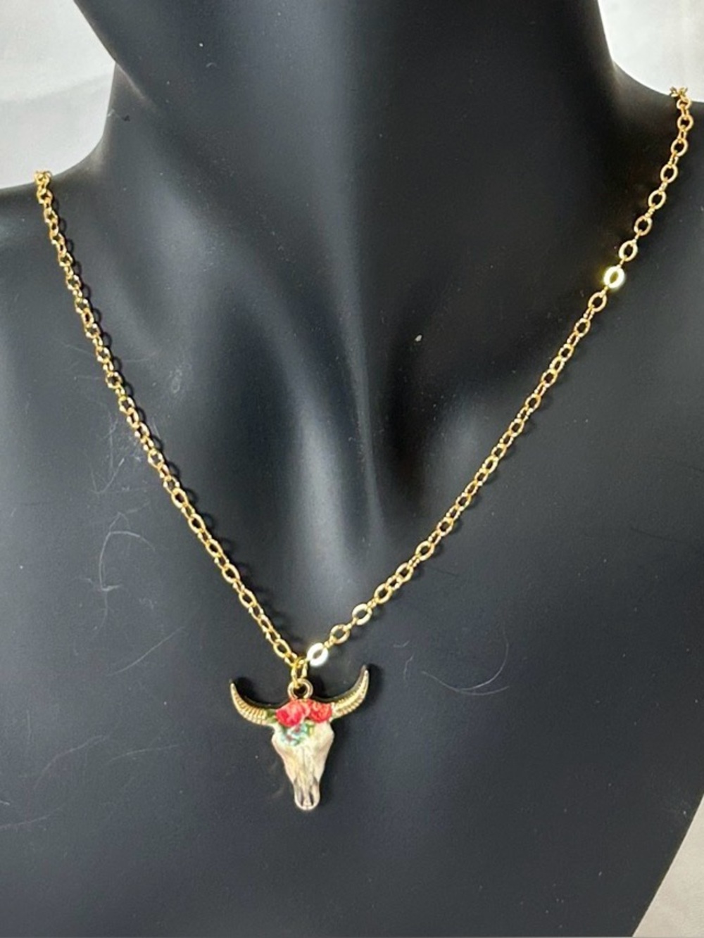 Beautiful Gold Tone Cow Skull Necklaces. Measures 18” W/ 2 “ Ext